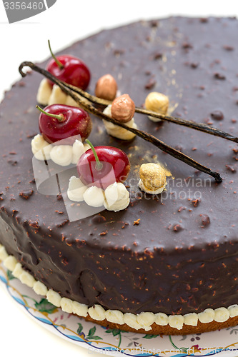 Image of Chocolate cake with cherries.
