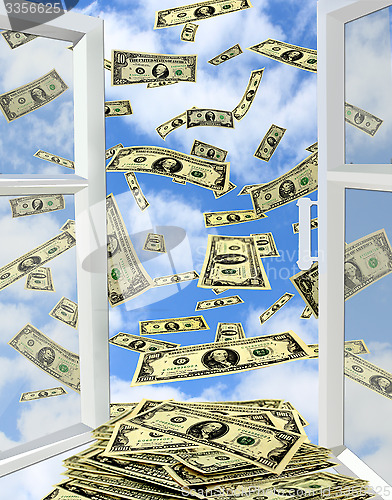 Image of dollars flying out from opened window