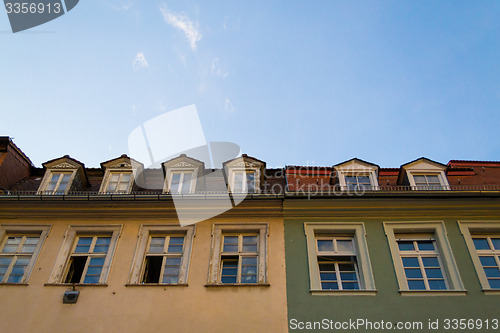 Image of green and yellow houses