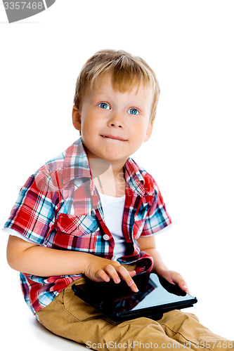 Image of Little boy with a tablet computer