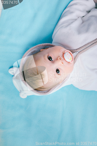 Image of Baby on a blue blanket