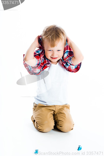 Image of Little cheerful blue-eyed boy