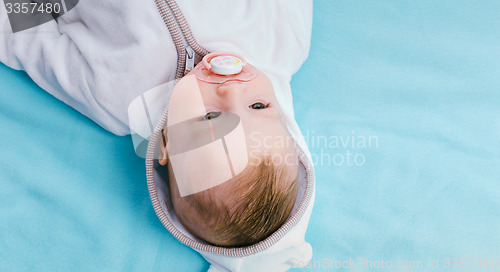 Image of Baby on a blue blanket