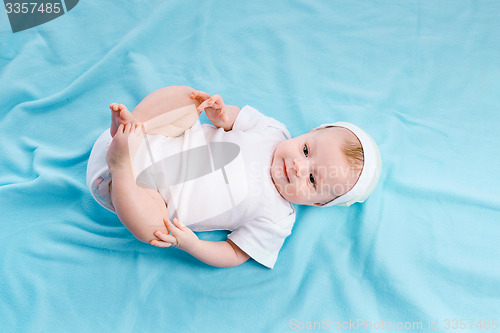 Image of Baby on a blue blanket