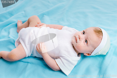 Image of Baby on a blue blanket