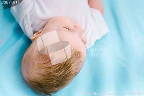 Image of Baby on a blue blanket