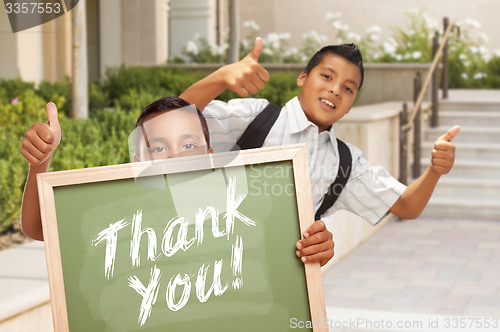 Image of Boys Giving Thumbs Up Holding Thank You Chalk Board