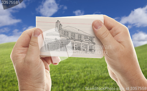 Image of Male Hands Holding Stack of Flash Cards