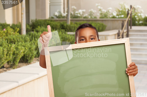 Image of Boy with Thumbs Up Holding Blank Chalk Board on Campus