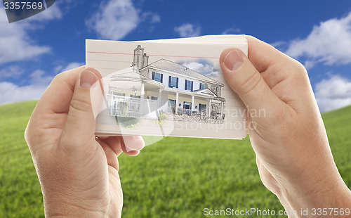 Image of Male Hands Holding Stack of Flash Cards