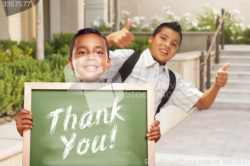 Image of Boys Giving Thumbs Up Holding Thank You Chalk Board