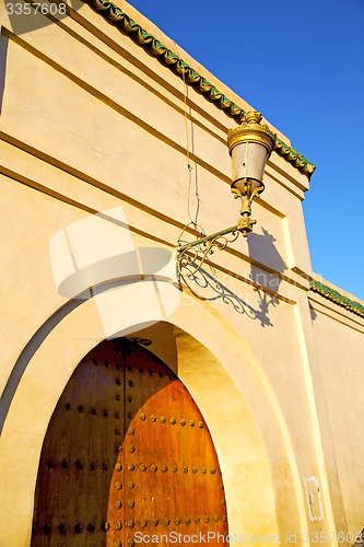 Image of  street lamp in morocco africa old archway