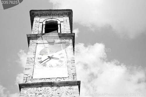 Image of ancien clock tower in italy europe old  stone and bell
