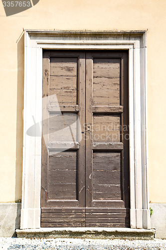 Image of old   door    in  wood and traditional  texture nail