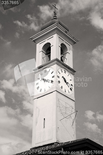 Image of ancien clock tower in italy europe old  stone and bell