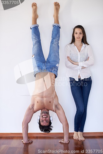 Image of happy young romantic couple have fun and  relax at home indoors