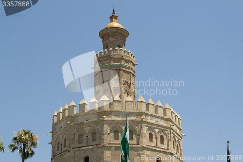 Image of Andalusia flag by the Gold tower