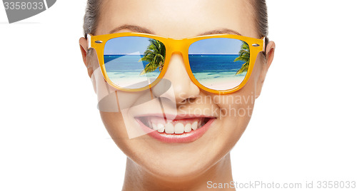 Image of happy teenage girl in sunglasses