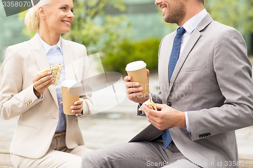 Image of close up of business couple at coffee break