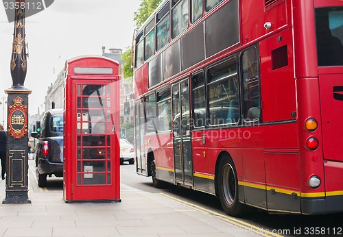 Image of double decker bus and telephone booth in london