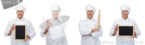 Image of happy male chef baker with menu board showing ok