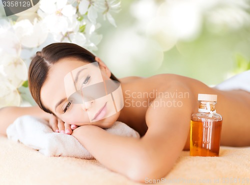 Image of happy woman in beauty spa