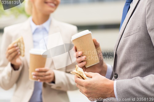 Image of close up of business couple at coffee break