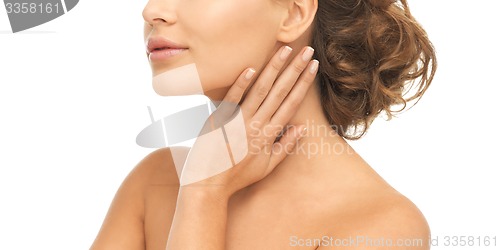 Image of face and hands of beautiful woman