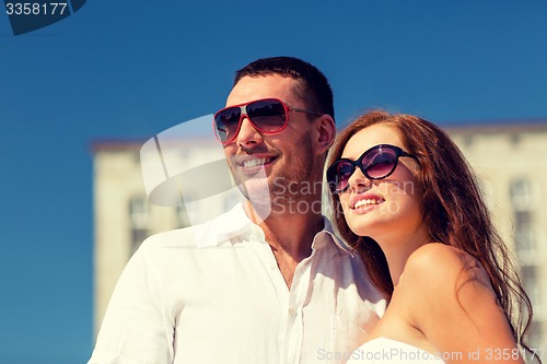 Image of smiling couple in city