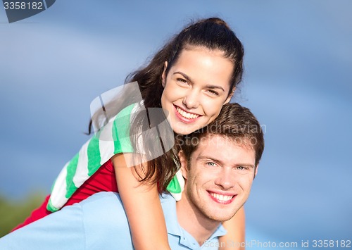 Image of group of happy couple having fun outdoors