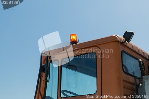 Image of close up of road service car cabin with flasher