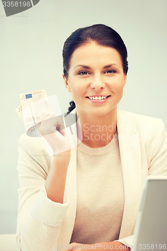 Image of lovely woman with euro cash money