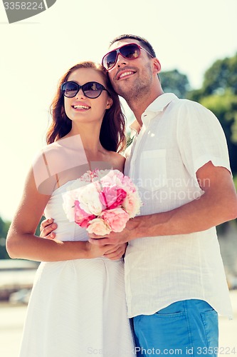 Image of smiling couple in city