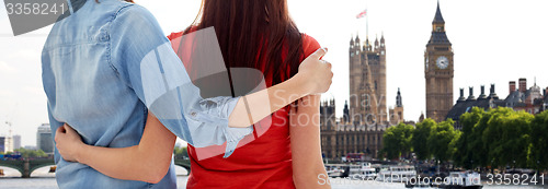 Image of close up of happy lesbian couple over big ben