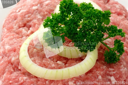 Image of Meatloaf with onion rings and herbs