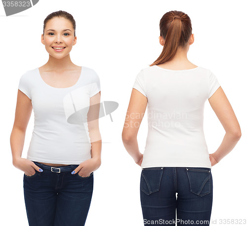 Image of smiling young woman in blank white t-shirt