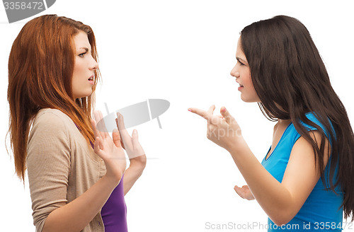 Image of two teenagers having a fight