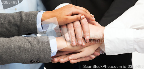 Image of group of businesspeople celebrating victory