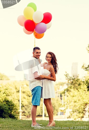 Image of smiling couple in city