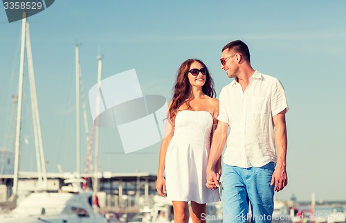 Image of smiling couple in city