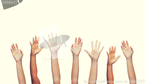 Image of human hands waving hands