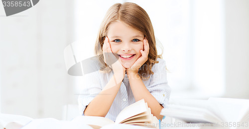 Image of student girl studying at school