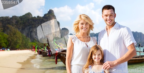 Image of happy family over thailand or bali beach