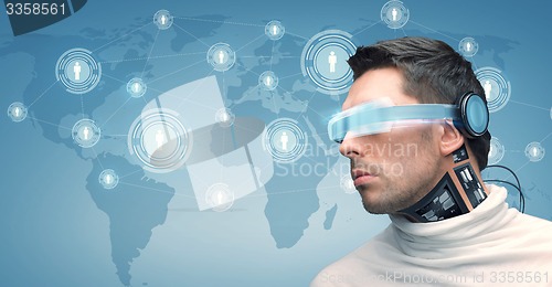 Image of man with futuristic glasses and sensors