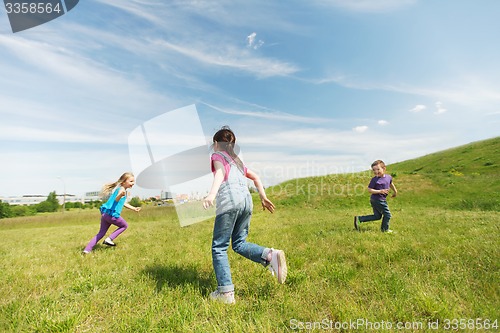 Image of group of happy kids running outdoors