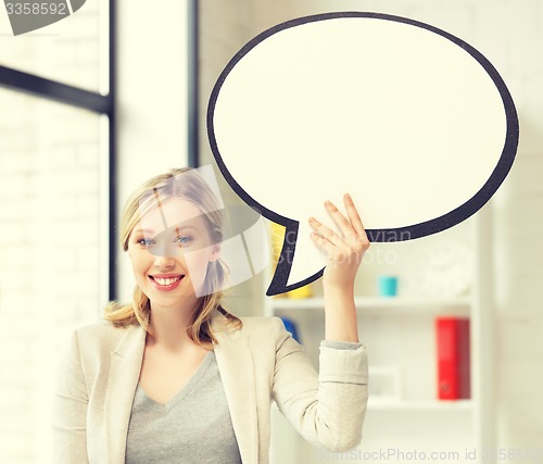 Image of smiling businesswoman with blank text bubble