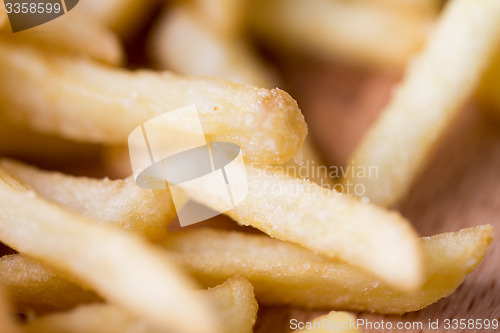 Image of close up of french fries on table