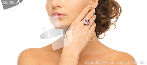 Image of woman with one cocktail ring