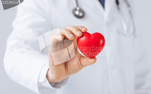 Image of man hands with heart