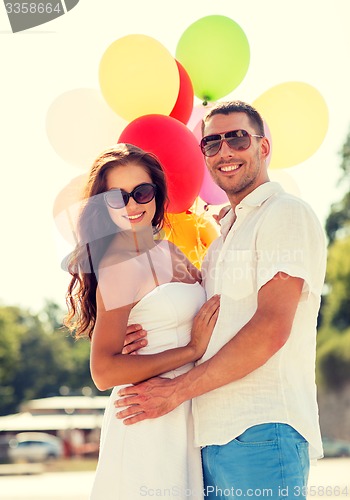 Image of smiling couple in city